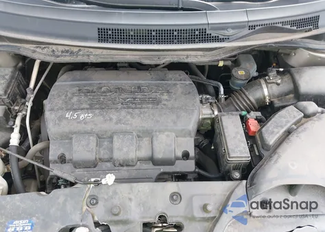 2012 Honda Odyssey Lx z USA, uszkodzony, nr VIN 5FNRL5H2XCB061198